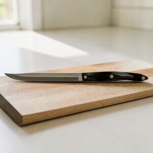 CUTCO 1729 JI Olean, NY U.S.A. Serrated Edge Black Handle Carving Slicing Knife